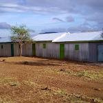 Classrooms provided by Michelle Chiou Foundation.  Teacher office to right by STF.  Met Michelle Chiou in Kenya on safari.  She introduced herself and said she was looking to support schools in Kenya.  We said we are here in Kenya to assist a primary school.  She has helped us on several projects.